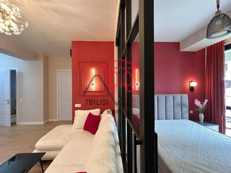 A three-bedroom apartment with a separate dressing room is for sale in the Monolit Green City residential complex. The apartment is fully furnished with high-quality furniture and appliances. The complex features a swimming pool, fitness center, padel tennis courts, a soccer field, and a large, green, guarded courtyard. A school and a kindergarten are also on site. A TV, dining table, and chairs will be installed. — фото 4