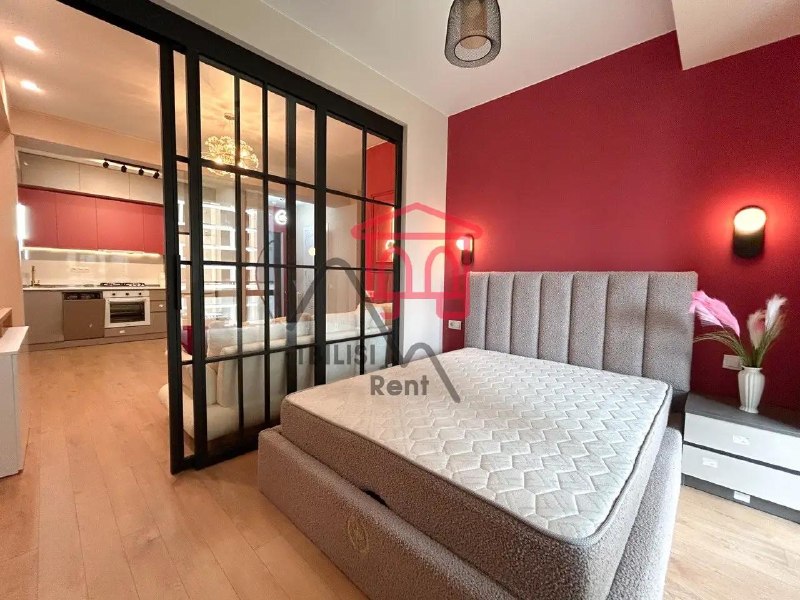 A three-bedroom apartment with a separate dressing room is for sale in the Monolit Green City residential complex. The apartment is fully furnished with high-quality furniture and appliances. The complex features a swimming pool, fitness center, padel tennis courts, a soccer field, and a large, green, guarded courtyard. A school and a kindergarten are also on site. A TV, dining table, and chairs will be installed. — фото 5