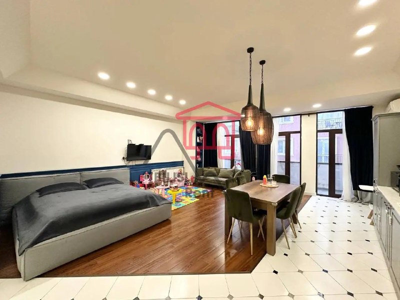 A spacious apartment with a modern designer renovation in a new building in the Vera district is for sale. The apartment features two bathrooms, two balconies with excellent views, and a walk-in closet. — фото 4