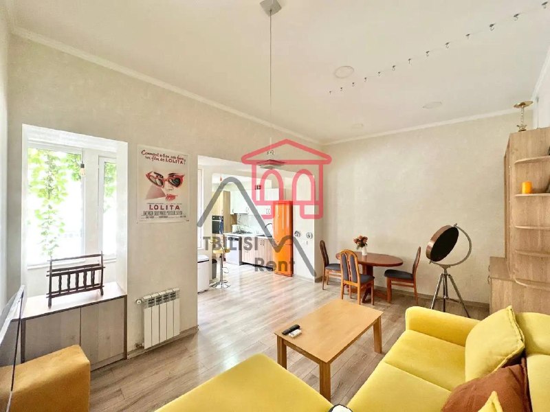An apartment for sale in the Vera district, next to the Shavi cafe and coworking space, on a cozy side street. The living area is 62 square meters plus a 53 square meter attic. — фото 2